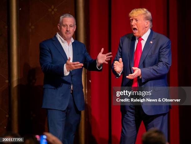 Republican Party chairman Michael Whatley introduces former President Donald Trump as he arrives for his address to the North Carolina Republican...