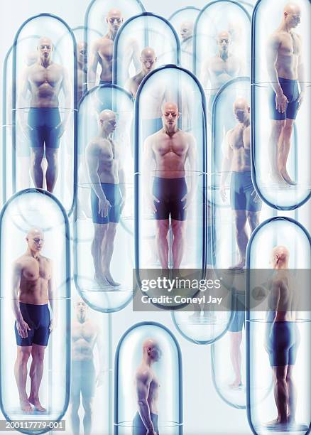cloned men standing in capsules, wearing shorts (digital composite) - cloning stock-fotos und bilder