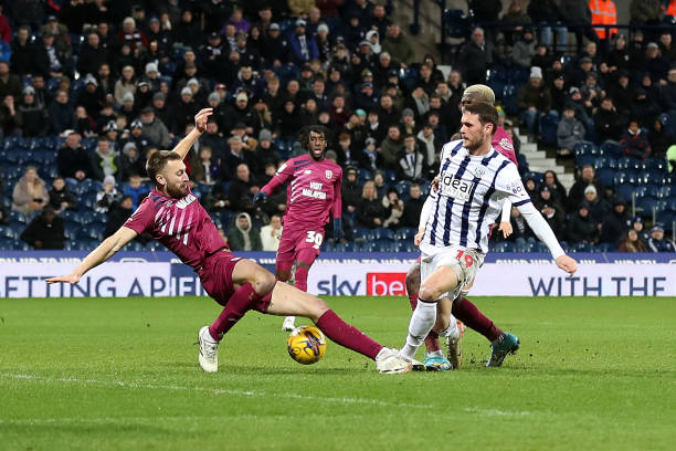 Nathaniel Phillips of Cardiff City stops John Swift of West Bromwich Albion shot at goal during the Sky Bet Championship match between West Bromwich...