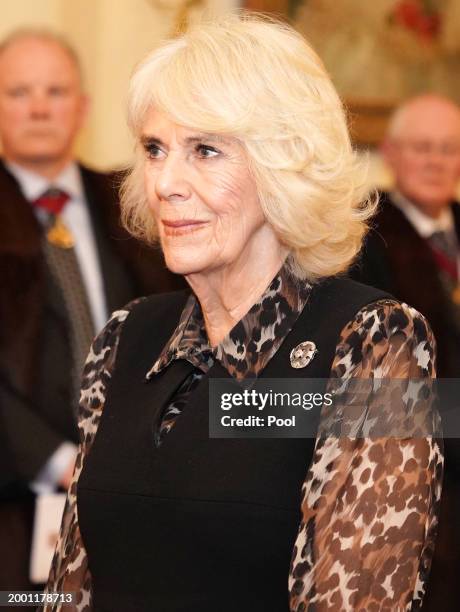 Queen Camilla is installed as Honorary Liveryman of the Worshipful Company of Fan Makers during a ceremony at Clarence House, where she will be...