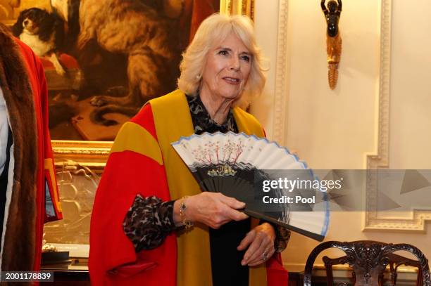 Queen Camilla was presented with a fan designed by Stewart Parvin during an installation ceremony at Clarence House, where she will be installed as...