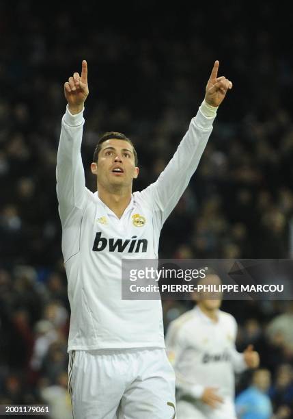 Real Madrid's Portuguese forward Cristiano Ronaldo celebrates after scoring during the Spanish league football match Real Madrid vs Zaragoza on...