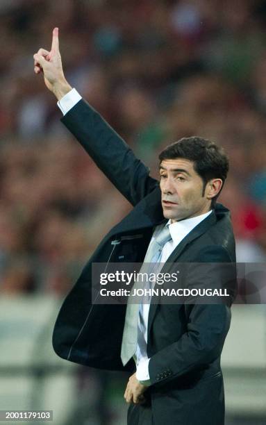 Sevilla FC's coach Marcelino García Toral gestures during the UEFA Europa League play off match Hanover 96 vs FC Sevilla in the northern German city...