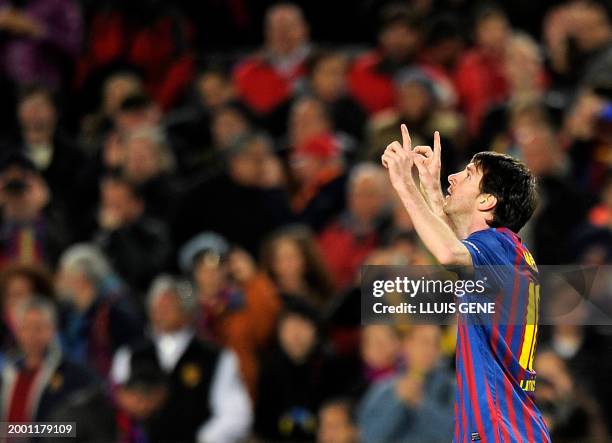 Barcelona's Argentinian forward Lionel Messi celebrates after scoring a goal during the UEFA Champions League football match, round of 16 second leg,...