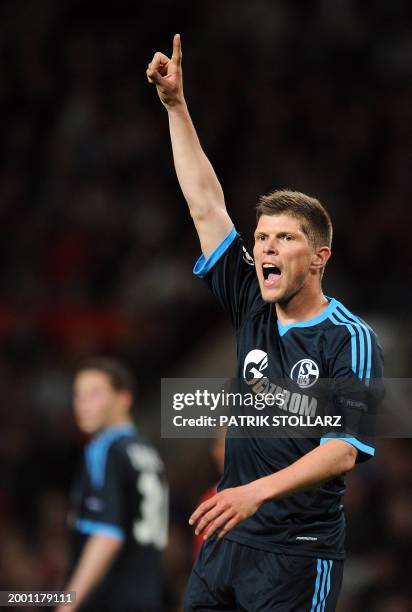 Schalke's Dutch striker Klaas-Jan Huntelaar reacts during the UEFA Champions League semi-final second leg football match between Manchester United...