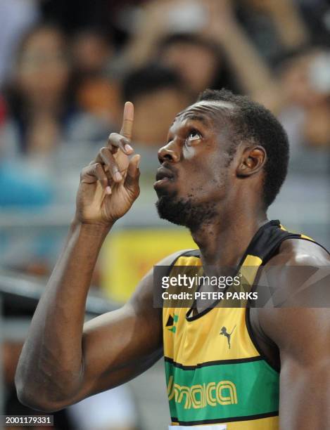 Jamaica's Usain Bolt waits for the start of the men's 100 metres heats at the International Association of Athletics Federations World Championships...