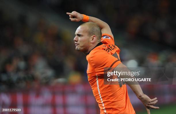 Netherlands' midfielder Wesley Sneijder reacts after Spain's midfielder Andres Iniesta scored during the 2010 World Cup football final Netherlands...