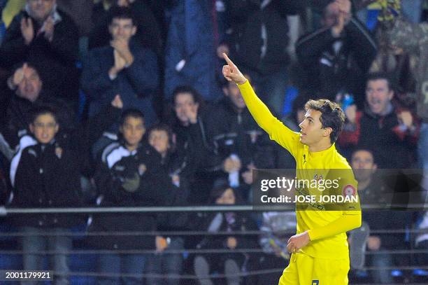 Villarreal's Brazilian forward Nilmar celebrates after scoring a goal during the Spanish league football match Villareal CF vs Sevilla FC on December...