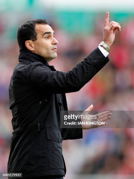Wigan Athletic's Spanish Manager Roberto Martinez gestures during the English Premier League football match between Stoke City and Wigan Athletic at...