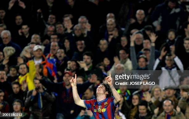 Barcelona's Argentinian forward Lionel Messi celebrates after scoring during the UEFA Champions League football match between Barcelona and VfB...