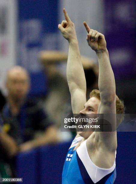 Finland's Tomi Tuuha celebrates after performing on the vault during the men seniors apparatus final, in the European Artistic Gymnastics...