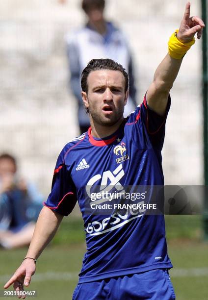 French national football team's forward Mathieu Valbuena reacts during a training session, on May 23 in Tignes in the French Alps, as part of the...