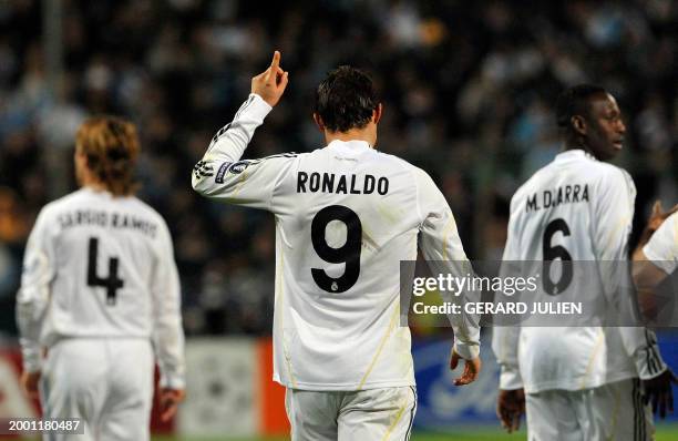 Real Madrid's Portuguese forward Cristiano Ronaldo celebrates after scoring during the UEFA Champions League football match Marseille vs Madrid, on...