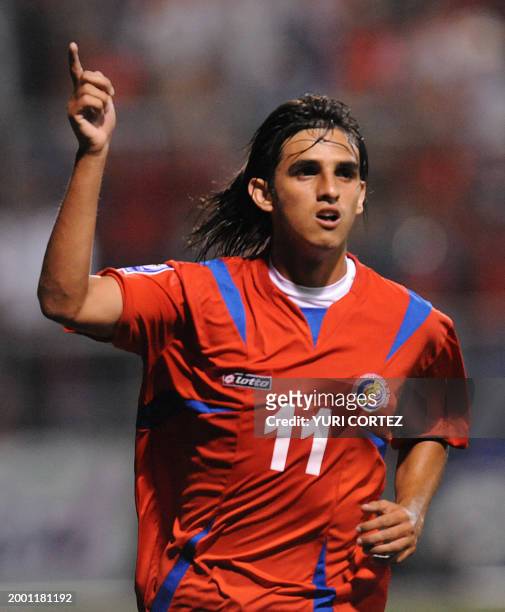 Costa Rican football player Bryan Ruiz celebrates after scoring the second goal against Grenada on June 21 at the Ricardo Saprissa stadium in San...