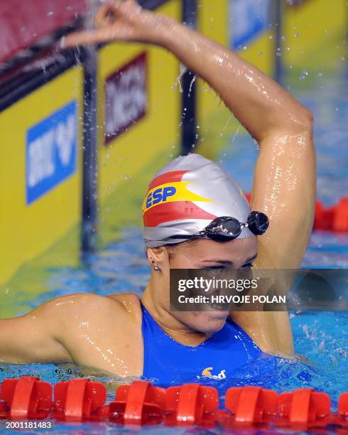 Spain's Maria Belmonte Garcia celebrates after winning the women's 400m individual medley race and setting the new world record during the European...