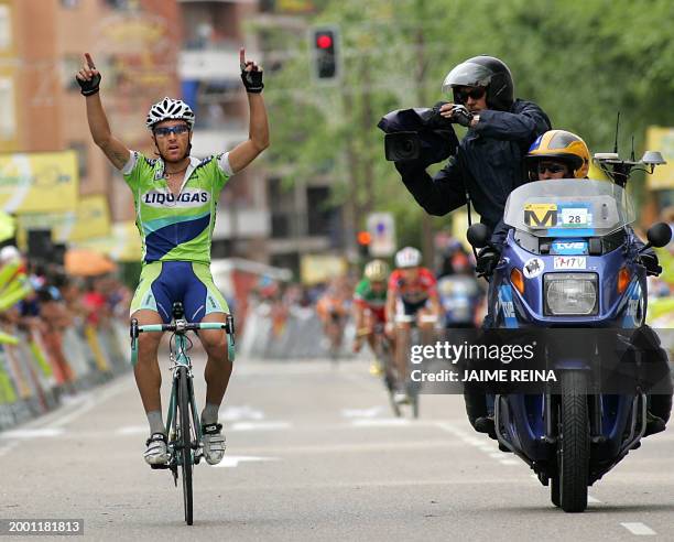 Italy's Luca Paolini of Liquigas Team celebrates at the finish line as the winner of the twelfth stage of the 61st edition of the Tour of Spain...