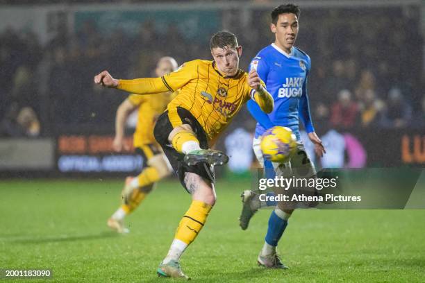 Scot Bennett of Newport County takes a shot at goal during the Sky Bet League Two match between Newport County and Notts County at Rodney Parade on...