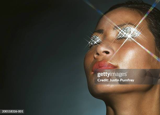 young woman with eyes closed, diamonds on eyelids - bling bling imagens e fotografias de stock