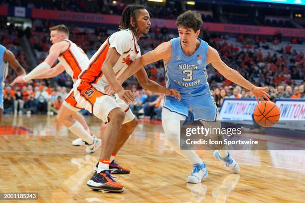 North Carolina Tar Heels Guard Cormac Ryan dribbles the ball against Syracuse Orange Forward Chris Bell during the first half of the College...