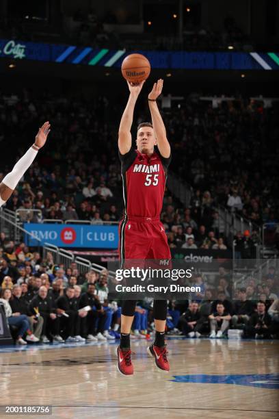 Duncan Robinson of the Miami Heat shoots the ball during the game against the Milwaukee Bucks on February 13, 2024 at the Fiserv Forum Center in...