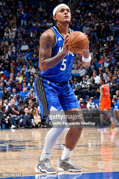 Paolo Banchero of the Orlando Magic shoots a free throw during the game against the Oklahoma City Thunder on February 13, 2024 at the Kia Center in...