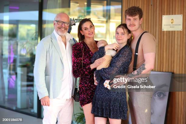 In this image released on February 14, 2024 Peter Olsson, Claudelle Deckert, Romy Deckert and Baby son Charly Dean Deckert and Christian Deckert...