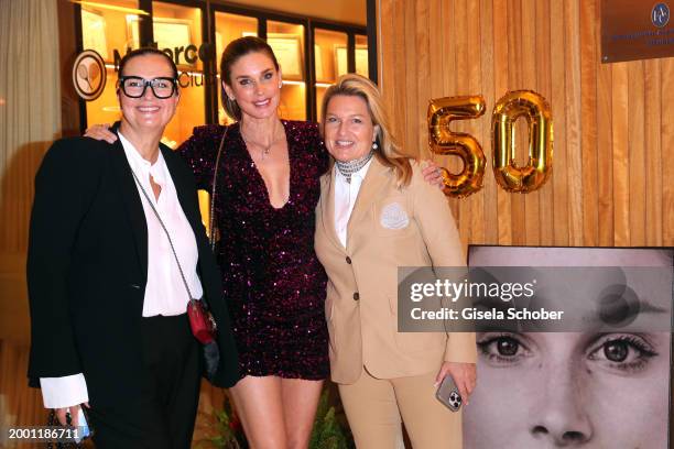 In this image released on February 14, 2024 Christiane Hoffmann, Claudelle Deckert, Claudia Anders during the 50th birthday party for Claudelle...