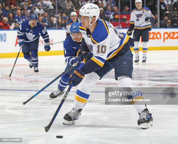 Brayden Schenn of the St. Louis Blues looks to take a shot against the Toronto Maple Leafs during the third period in an NHL game at Scotiabank Arena...