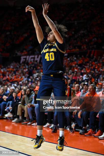 Michigan guard George Washington III shoots during a college basketball game between the Michigan Wolverines and the Illinois Fighting Illini on...
