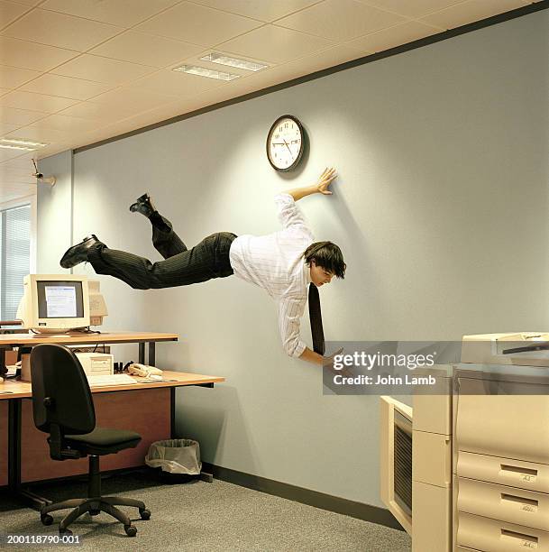 man in mid-air in office (digital composite) - name tag bildbanksfoton och bilder