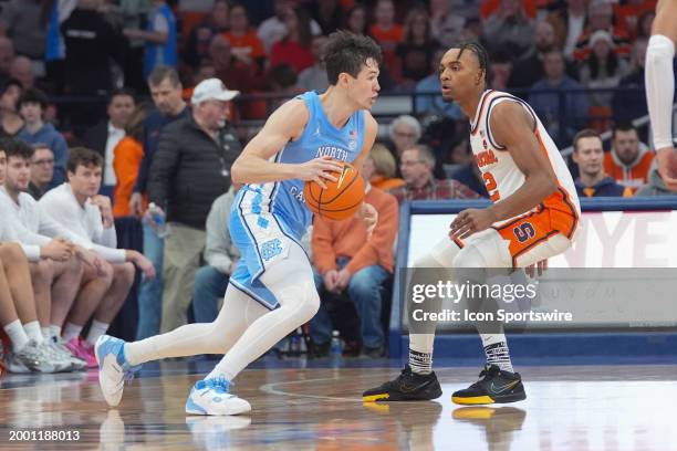 North Carolina Tar Heels Guard Cormac Ryan dribbles the ball against Syracuse Orange Guard JJ Starling during the second half of the College...