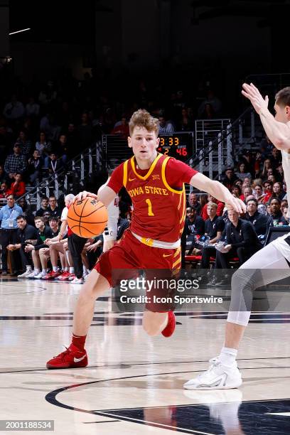 Iowa State Cyclones guard Jackson Paveletzke handles the ball during a college basketball game against the Cincinnati Bearcats on February 13, 2024...