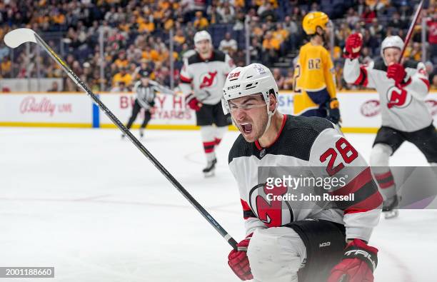 Timo Meier of the New Jersey Devils celebrates his goal against the Nashville Predators during an NHL game at Bridgestone Arena on February 13, 2024...