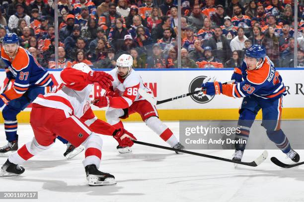 Ryan Nugent-Hopkins of the Edmonton Oilers takes a shot on net during the game against the Detroit Red Wings at Rogers Place on February 13 in...