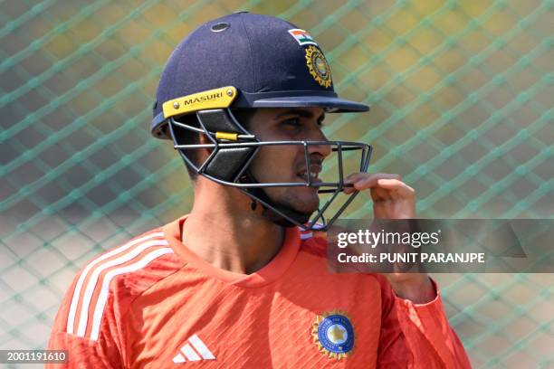 India's Shubman Gill prepares to bat at the nets during a practice session at the Saurashtra Cricket Association Stadium in Rajkot on February 14 on...