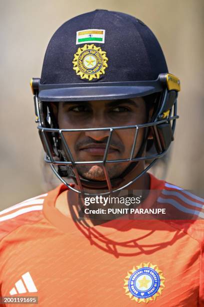 India's Shubman Gill prepares to bat at the nets during a practice session at the Saurashtra Cricket Association Stadium in Rajkot on February 14 on...