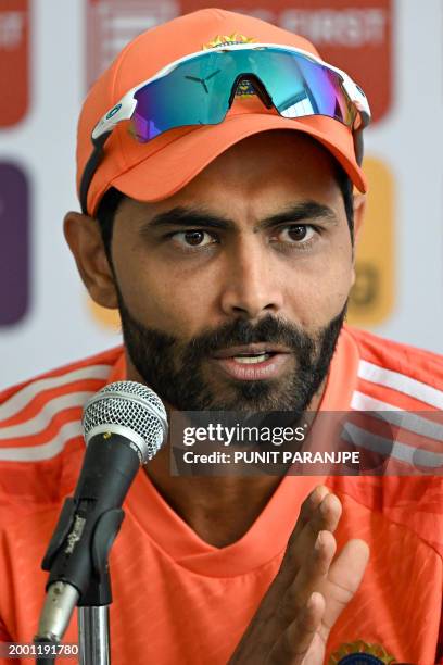 India's Ravindra Jadeja speaks during a press conference at the Saurashtra Cricket Association Stadium in Rajkot on February 14 on the eve of the...