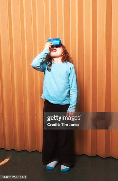 girl (6-8) looking through picture viewer - viewfinder stock pictures, royalty-free photos & images