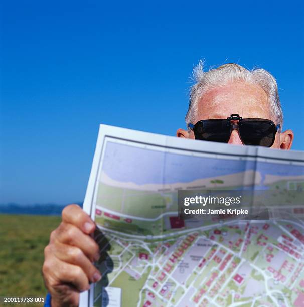 Top View Man Map Covering Map Photos and Premium High Res Pictures - Getty Images