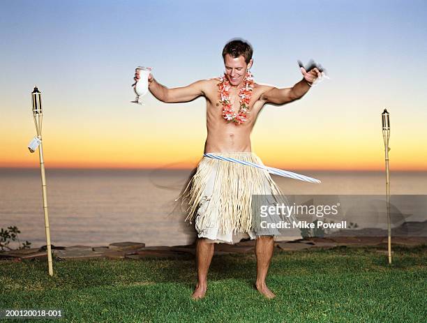 1,217 Grass Skirt Stock Photos, High-Res Pictures, and Images - Getty Images
