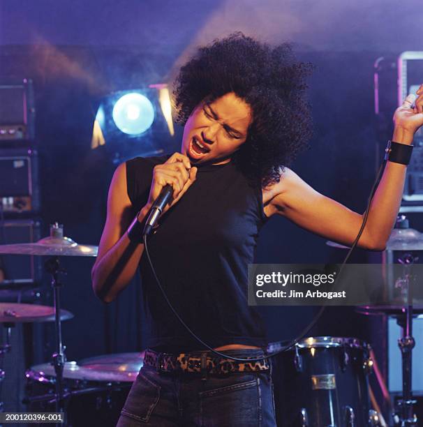 Lady Roking Singer 8,412 Female Rock Star Stock Photos, High-Res Pictures, and Images ...