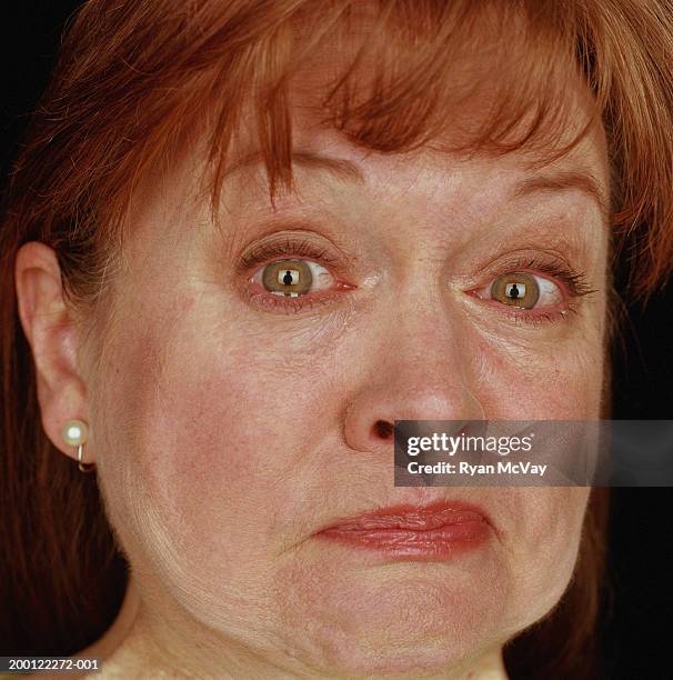 Mature Woman Holding Back Tears Portrait Closeup High-Res Stock Photo ...