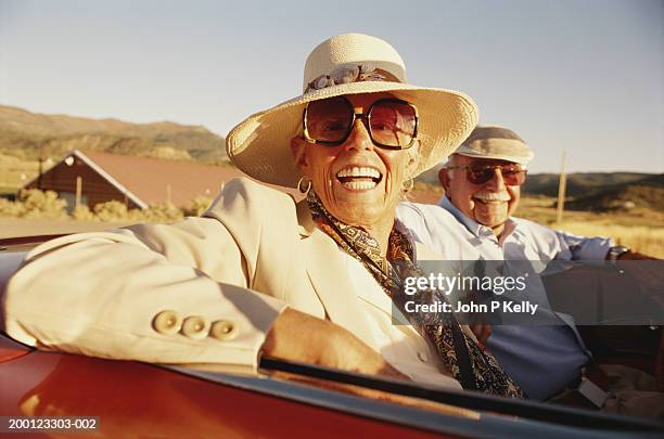 mature couple in car smiling, portrait - big sunglasses stock pictures, royalty-free photos & images