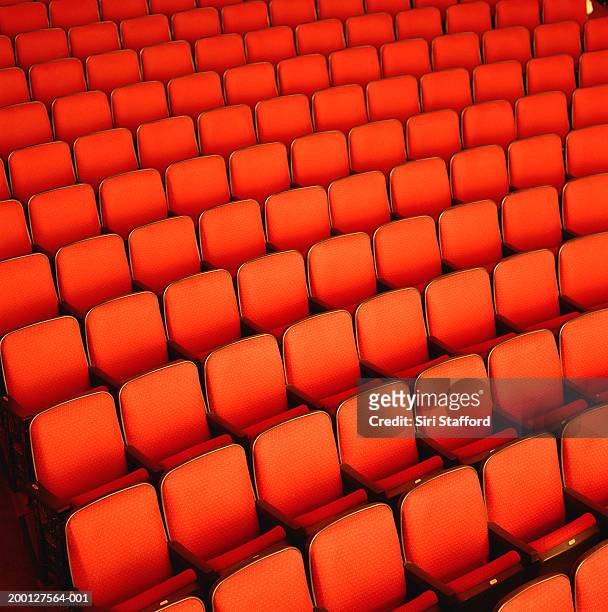 rows of red theater seats, overhead view - chairs in a row stock pictures, royalty-free photos & images