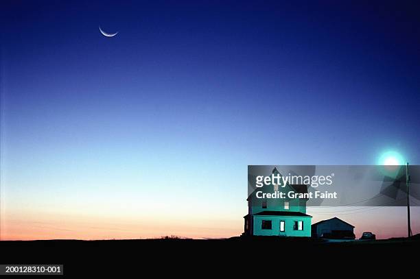 farmhouse, sunset (digital composite) - remote location stock-fotos und bilder
