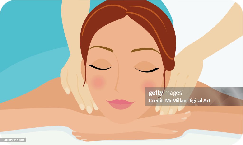 Woman receiving shoulder massage, close-up