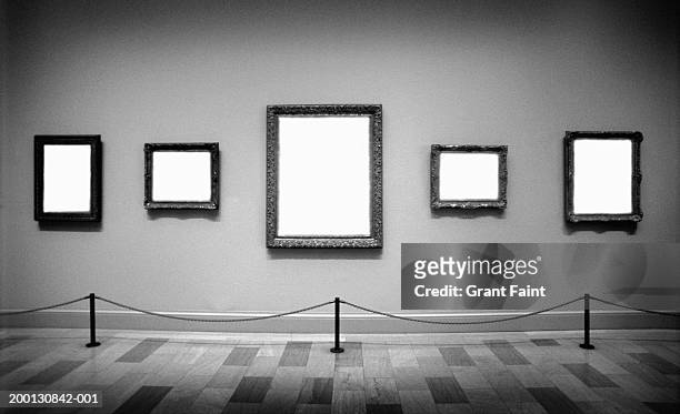 empty frames in art gallery (digital composite, b&w) - art gallery interior stockfoto's en -beelden