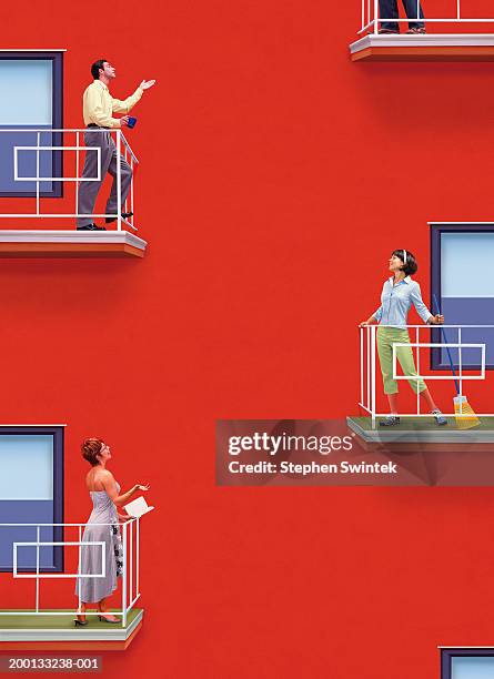 neighbors standing on balconys of apartment, talking - vicino foto e immagini stock