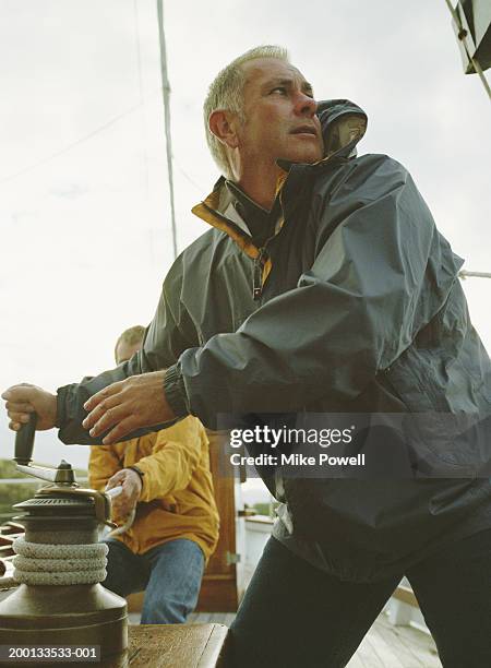 Cranking Rope 591 Man Crank Stock Photos, High-Res Pictures, and Images - Getty Images