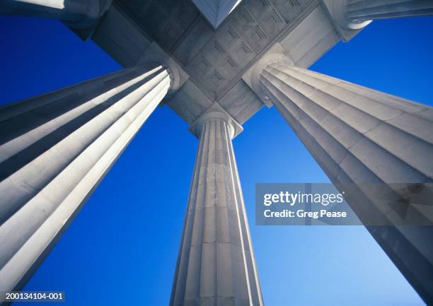 doric columns, low angle view (digital enhancement) - architectural column stock pictures, royalty-free photos & images